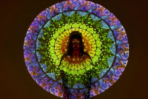 Vibrant mandala projected onto person, - Credits: pexels