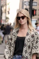 Stylish woman wearing sunglasses and - Credits: pexels