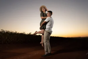 Happy couple embracing on a - Credits: pexels
