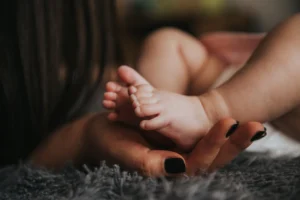 Close-up of a mother's hand - Credits: pexels