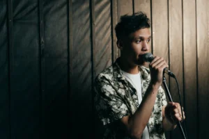 A young male singer in - Credits: pexels