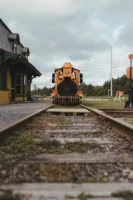 A vintage yellow train on - Credits: pexels