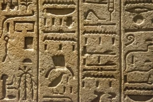 Close-up of ancient Egyptian hieroglyphs - Credits: pexels