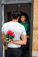 A man surprises a woman - Credits: pexels