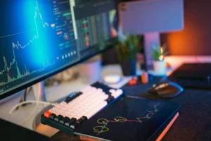 Modern workspace with screens displaying - Credits: pexels