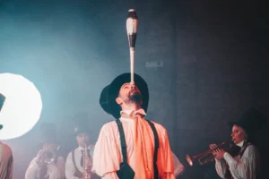 A circus performer balances a - Credits: pexels