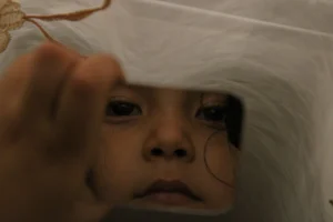 Close-up of a child gazing - Credits: pexels